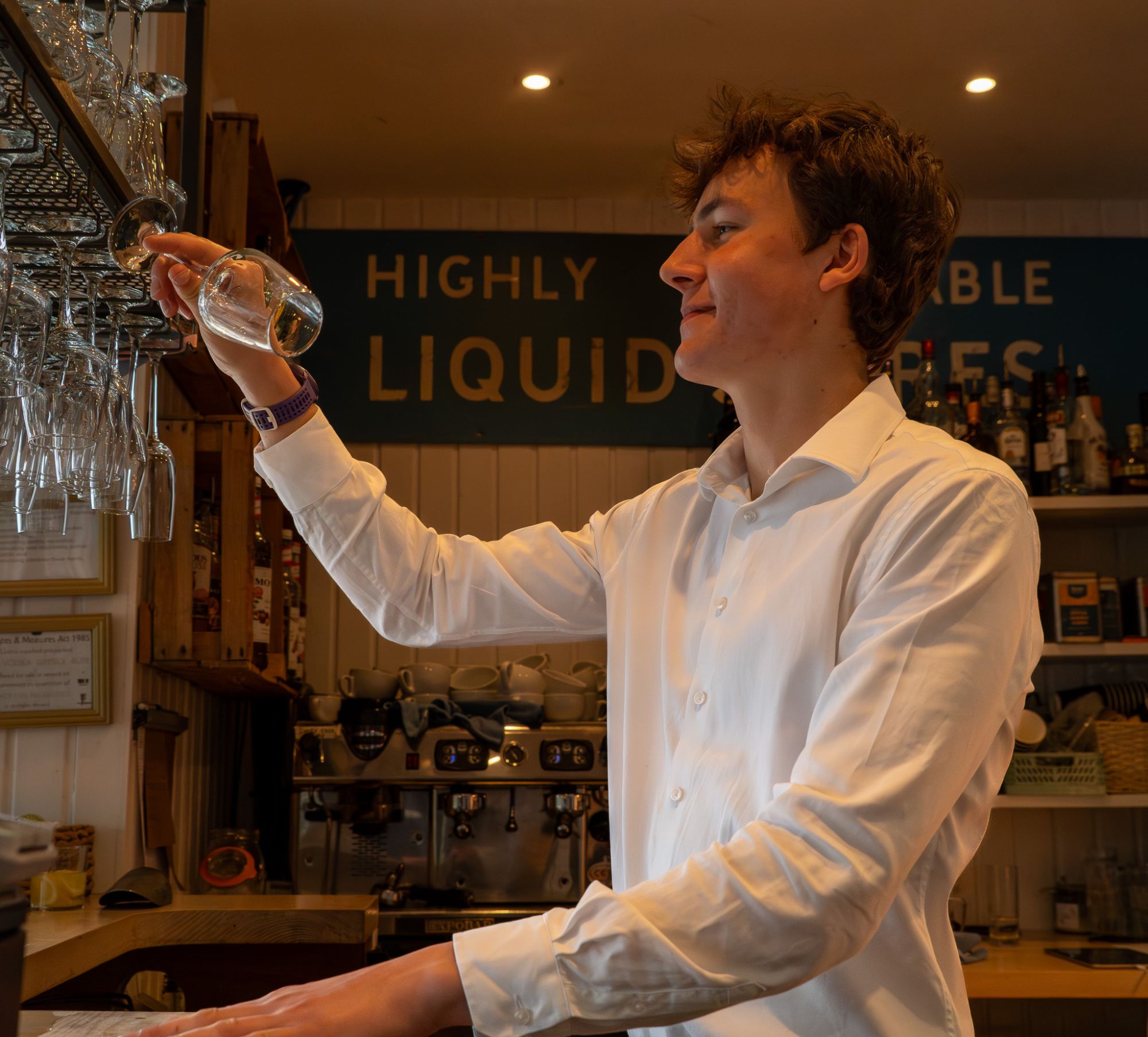 Front of house team behind the bar at Venachar Lochside