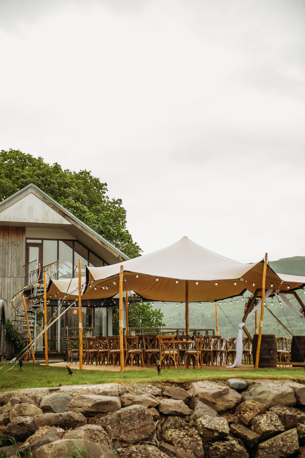 The stretch tent set up for a ceremony beside the venue